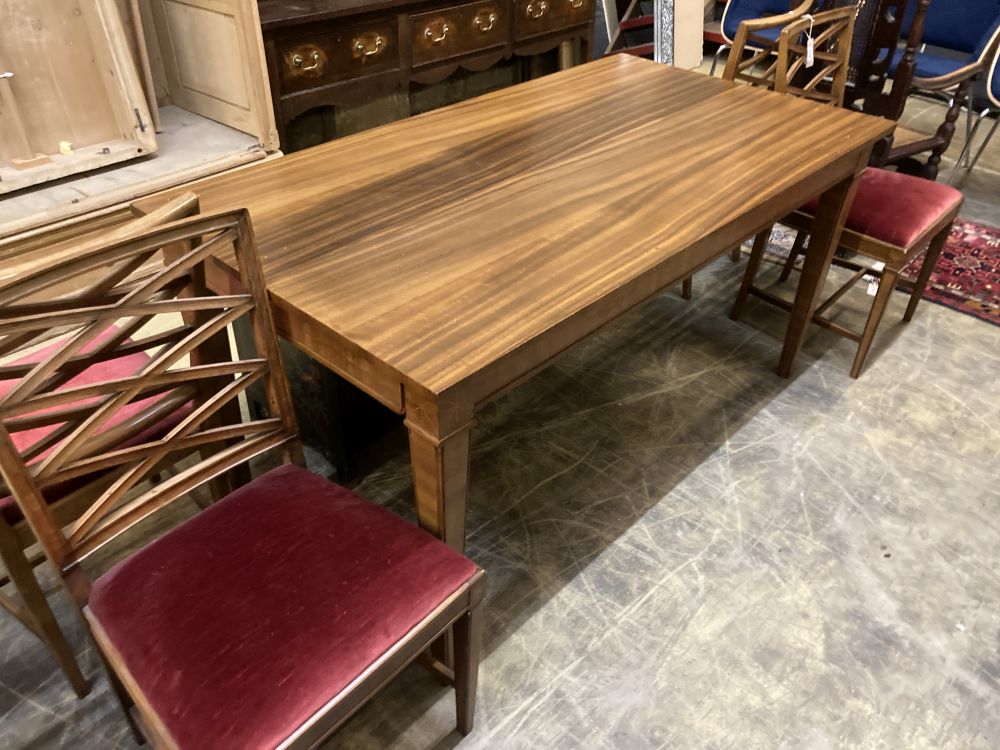 A Swedish dining table and four chairs, table 270cm extended (two spare leaves) width 80cm height 74cm